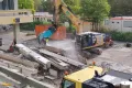 zerkleinerung Betonbauteile mit einem Bagger