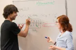 Students at a blackboard