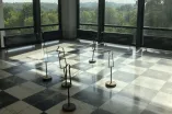 some pieces are standing on a chessboard in a RUB building of the G-row