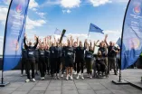 Gruppenfoto der Fackelträger*innen an der Ruhr-Universität Bochum anlässlich der World University Games 2025 in der Region Rhein-Ruhr.