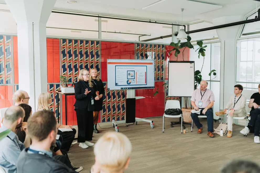 Foto: Vortragende und Publikum bei einer UNIC Konferenz